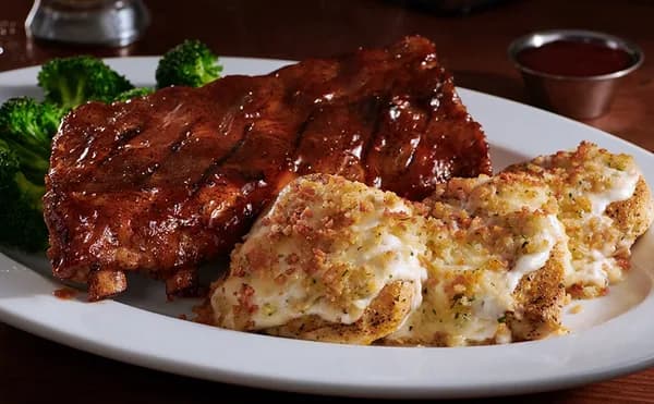 9 oz Parmesan Crusted Chicken with Half-Rack Baby Back Ribs